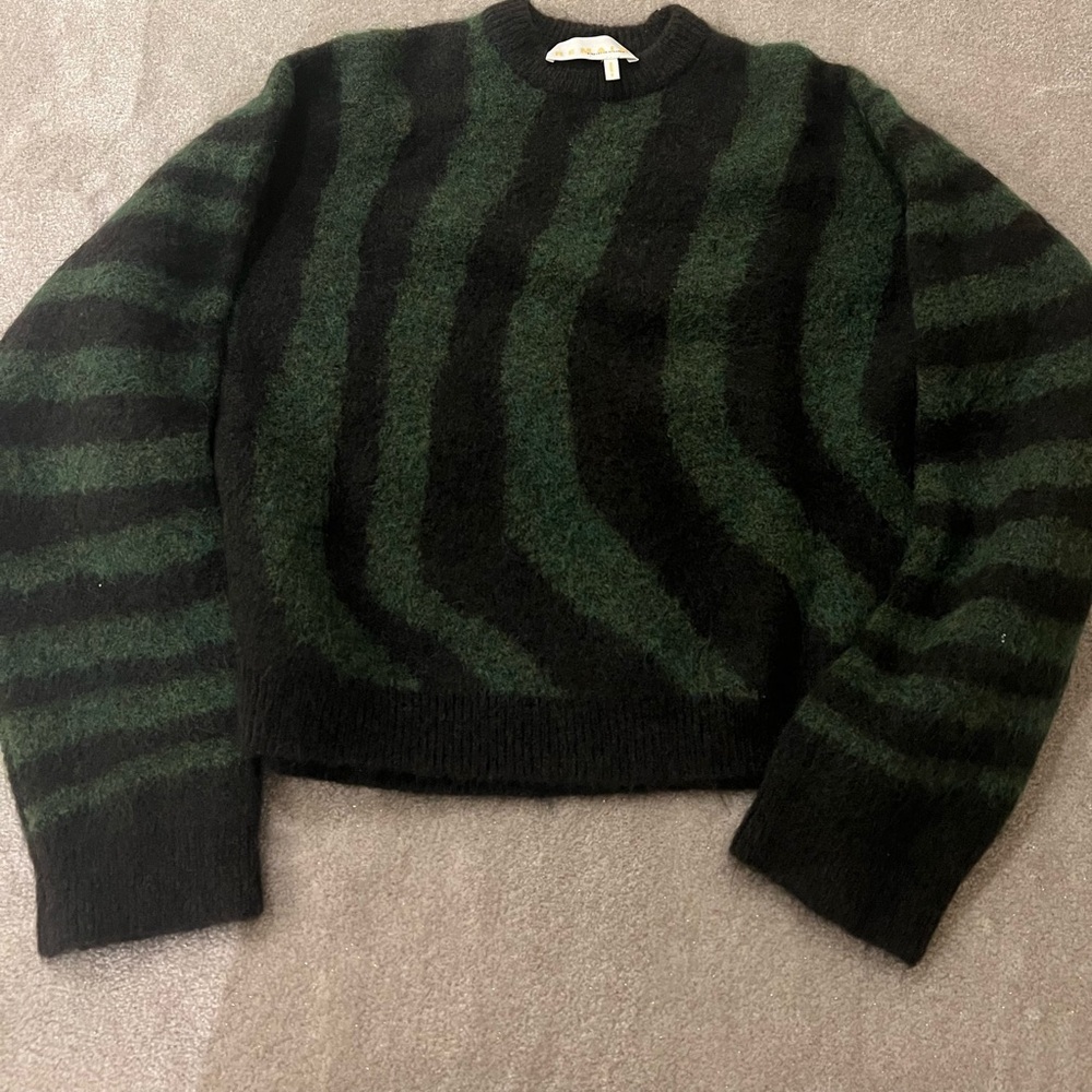 Green and black wool sweater